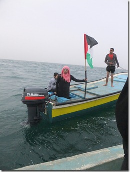 Gaza's woman fisher, Madleen Kolab, protesting at sea